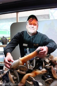 BC Shellfish representative poses with geoduck
