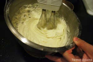 Whipping the frosting Whipping the frosting