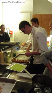 Chefs putting out mini sliders