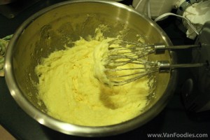 Beat sugar, butter, eggs and vanilla extract together