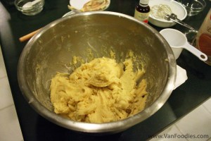 Stop when the dough is not sticky and you can form it into a ball easily