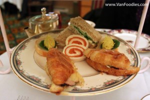 Bottom tier with petit sandwiches