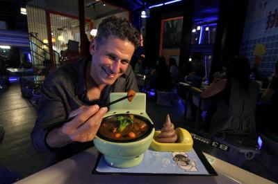 Eating out of plastic toilet bowl in Taipei - Photo Credit: The Show's Facebook Page Eating out of plastic toilet bowl in Taipei - Photo Credit: The Show's Facebook Page
