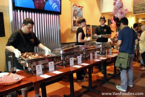 Staff working the food stations