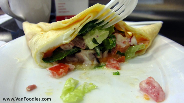 Check out the egg sandwiched between the crepe layers Check out the egg sandwiched between the crepe layers