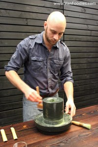 Grinding fresh matcha leaves