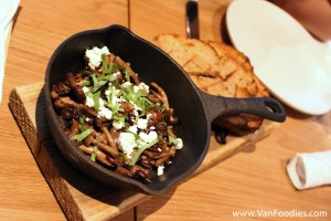 Foraged and cultivated mushrooms, Okanagan goat cheese, grilled caraway rye